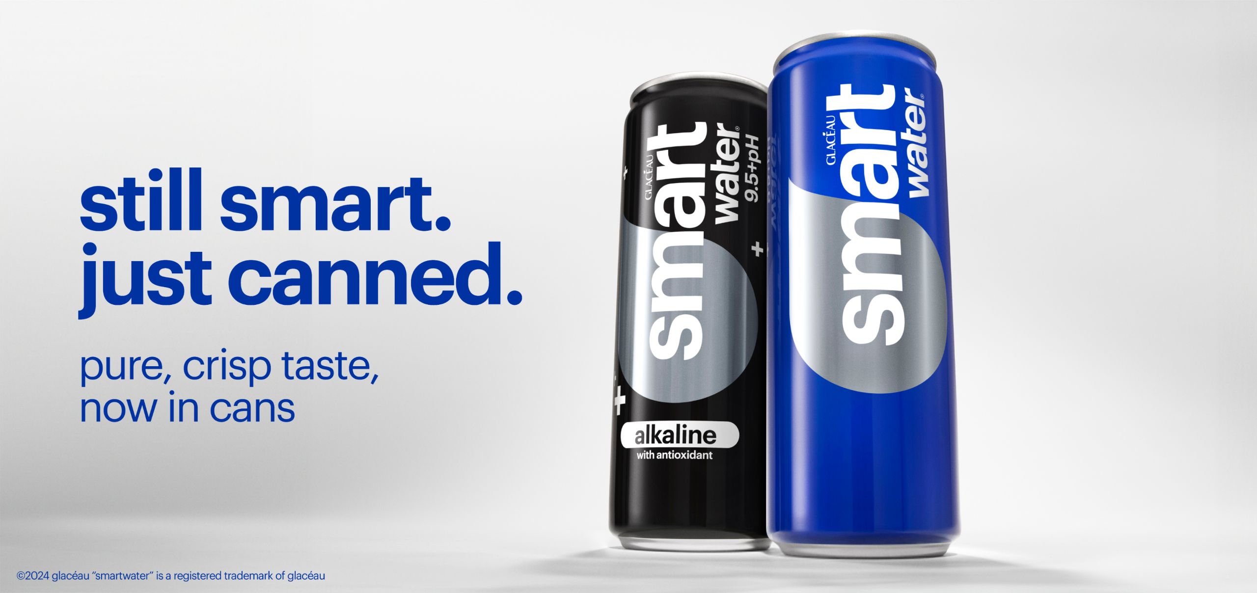 two cans of smart water with text that says: still smart. just canned. pure crisp taste now in cans