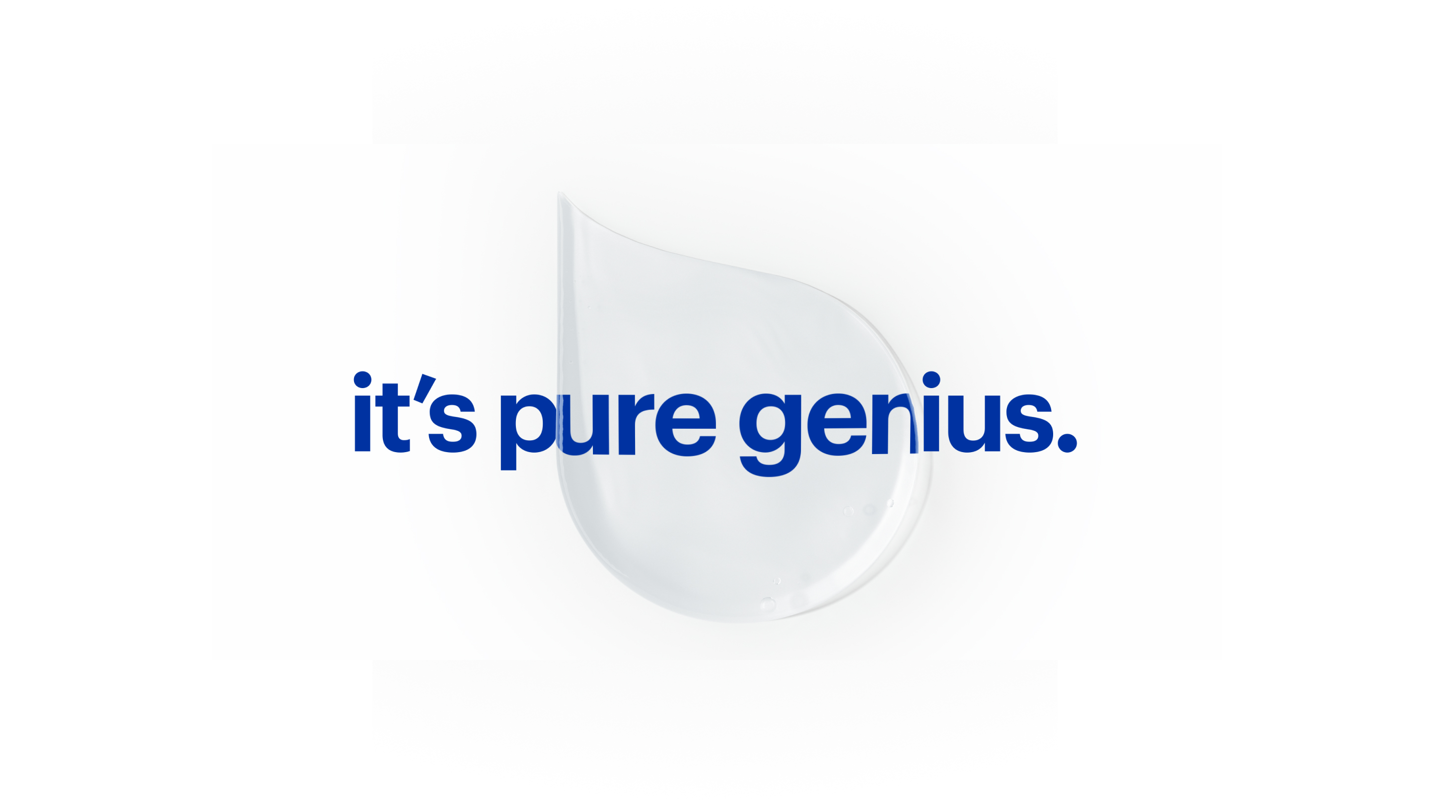 The phrase "it's pure genius." in front of a drop of water on with background
