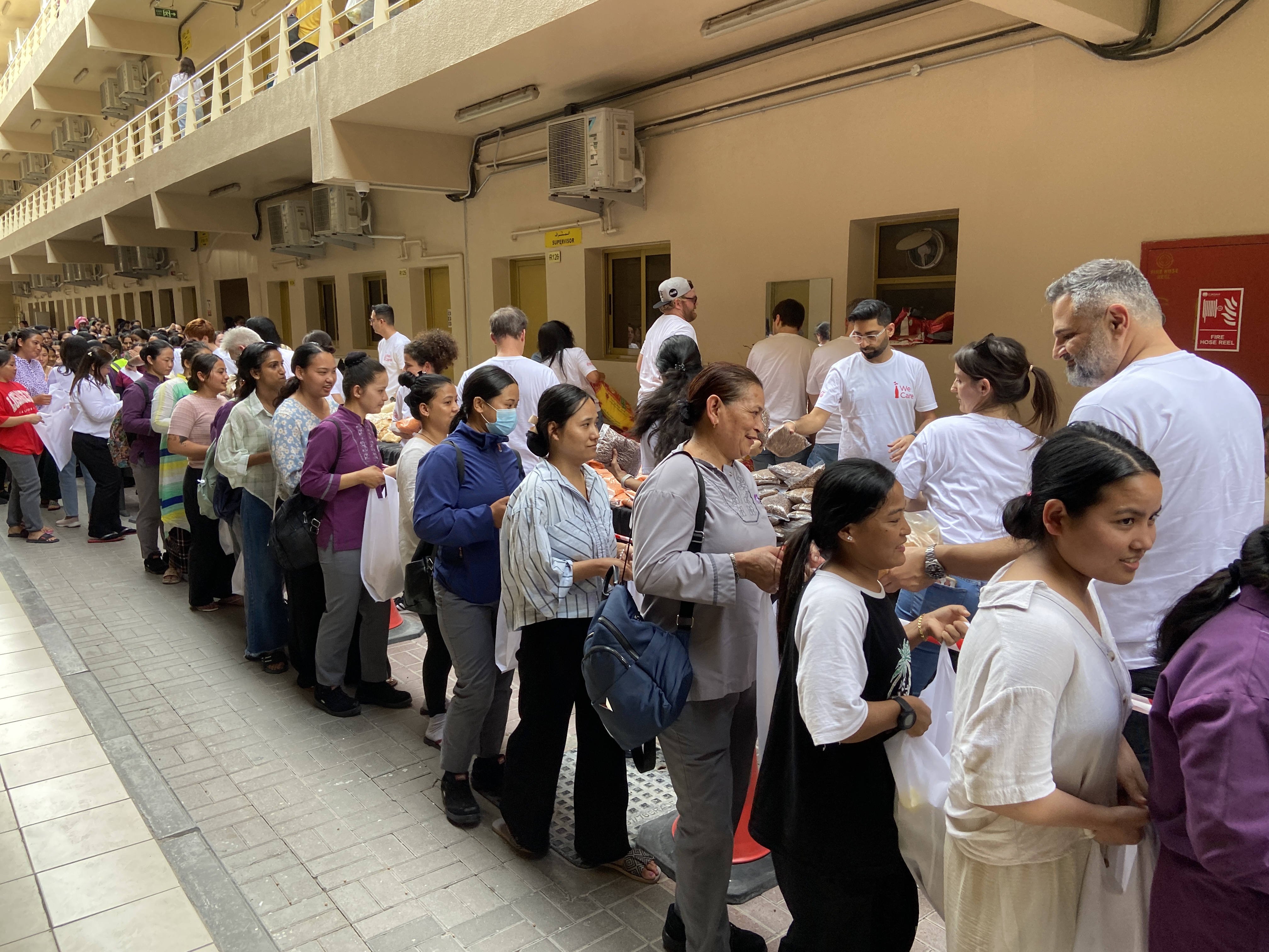 Coca Cola team distributes food parcels