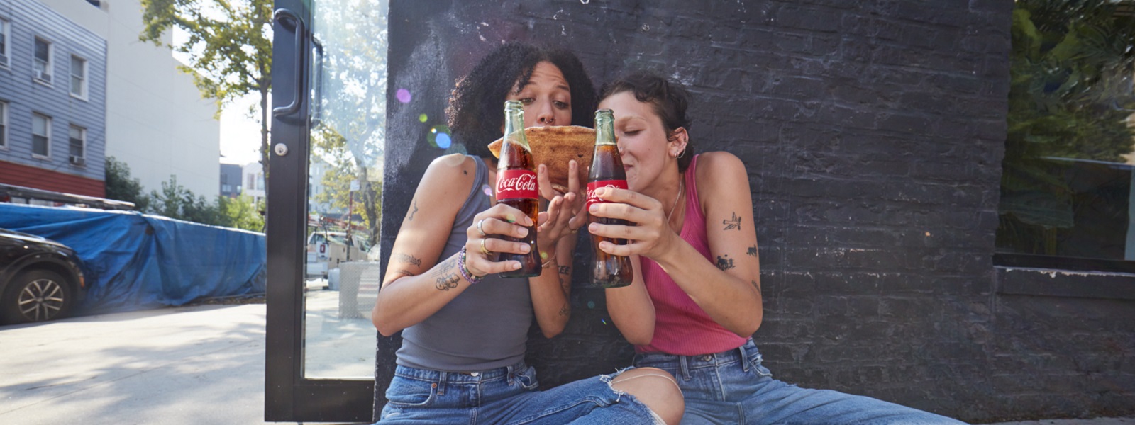 Razigrani baner s bocom Coca-Cole Zero s sloganom nema šećera #nema riječi okus je predobar za riječi