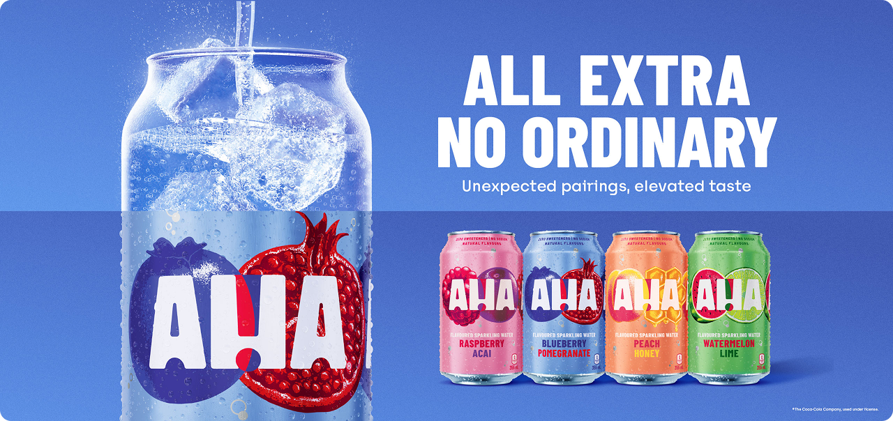 On a blue background, a large clear can-shaped glass on the left is filled with ice and sparkling water and shows the AHA logo with a blueberry and pomegranate. The text on the right reads "All extra, no ordinary" and "Unexpected pairings, elevated taste." Below it, four AHA flavoured sparkling water cans are lined up: Raspberry Acai, Blueberry Pomegranate, Peach Honey and Watermelon Lime.