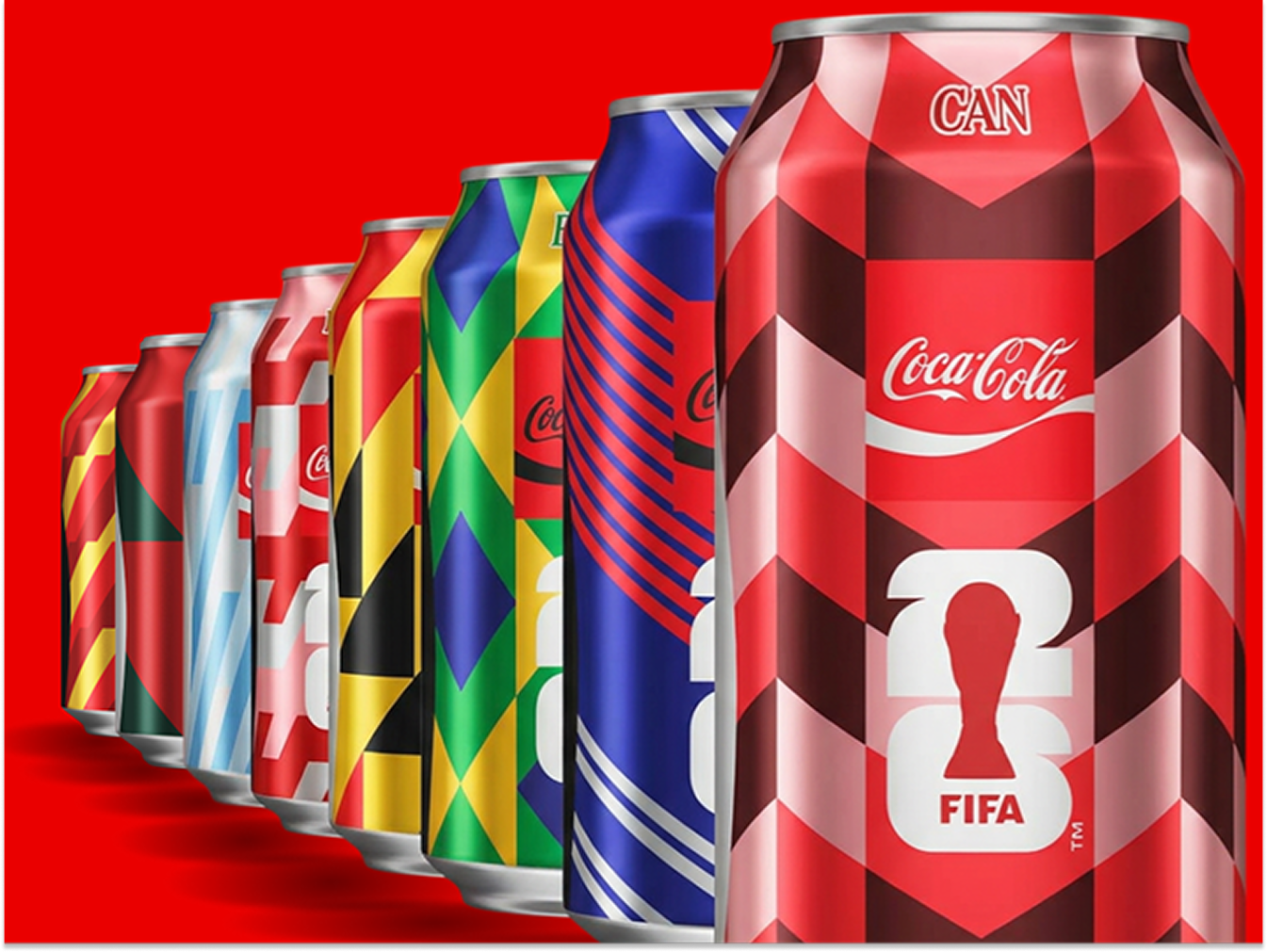 Row of Coca-Cola FIFA collectible cans with bold geometric patterns on a bright red background
