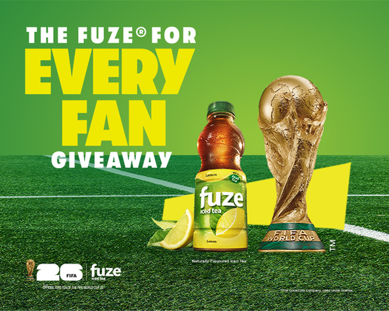 FUZE® iced tea lemon bottle beside golden FIFA World Cup Trophy on soccer field promoting FUZE® For Every Fan giveaway