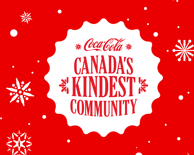 A white bottle-cap-shaped badge with red text reading "Coca-Cola Canada's Kindest Community," set against a red background decorated with white snowflakes and dots.