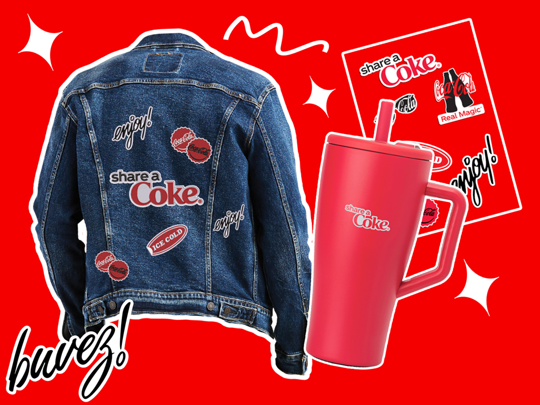 Share a Coke merch and prizes against a bright red background, including a Share a Coke jean jacket, a Coca-Cola branded tumbler cup, and a sheet of Share a Coke stickers.