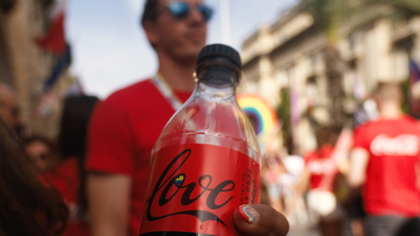 Coke bottle with love written on it