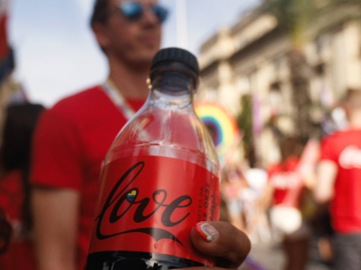 Coke bottle with love written on it