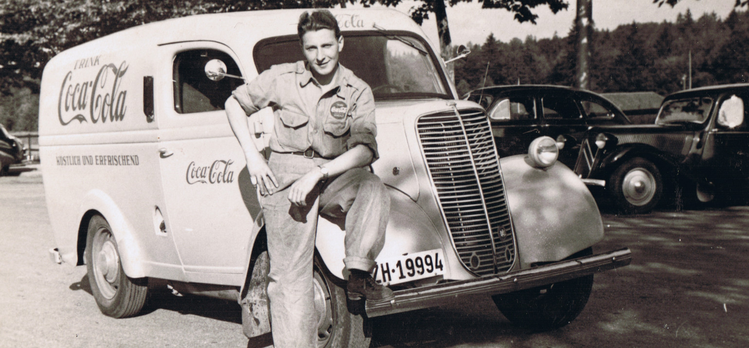 driver with coca-cola truck in switzerland