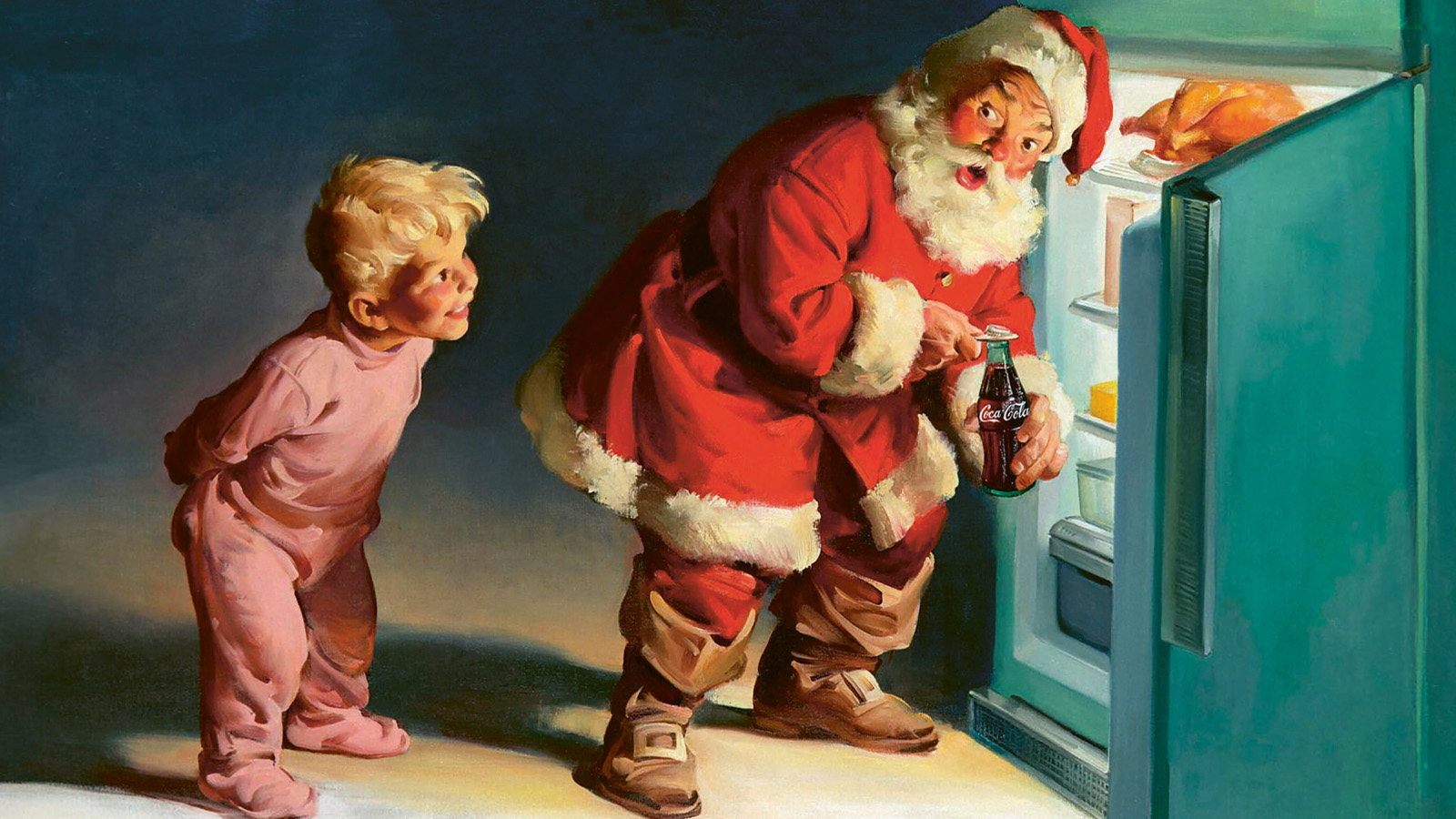 Santa standing in front of the fridge