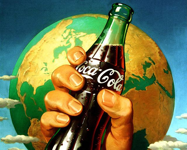Vintage colorful illustration of a hand holding a Coca-Cola bottle in front of a terrestrial globe