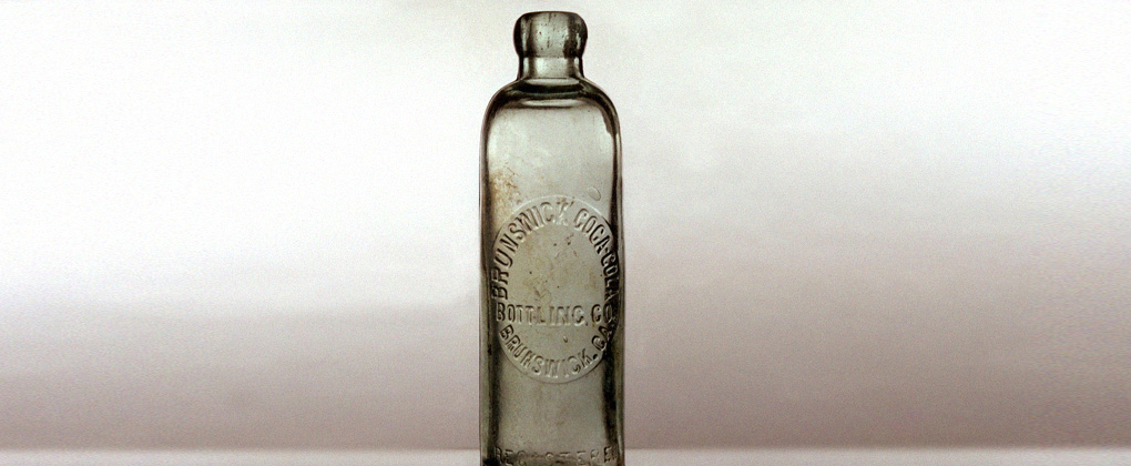 Eine alte Coca-Cola-Glasflasche