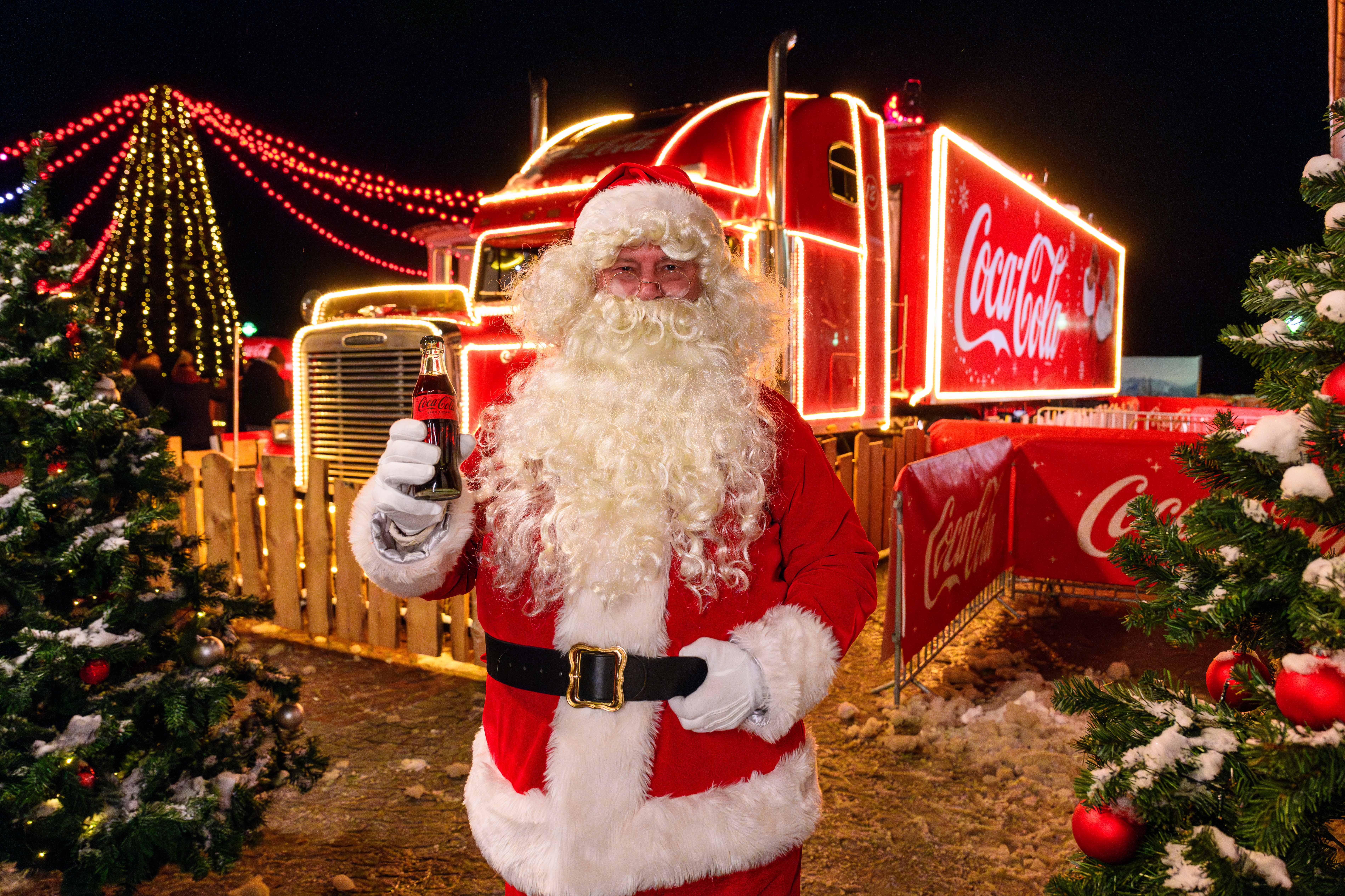 Coca-Cola Red Chrismas Truck with the image of Santa Clause drinking Coke