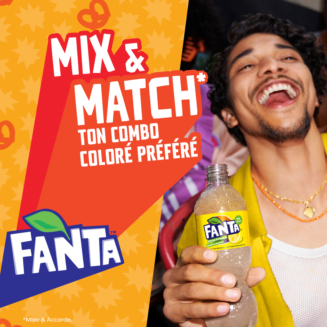 Woman drinking Fanta through straw
