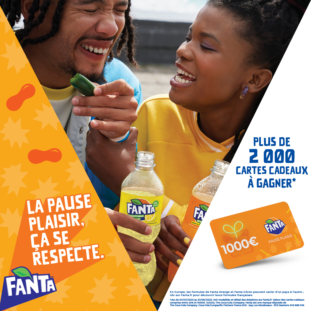 Woman drinking Fanta through straw