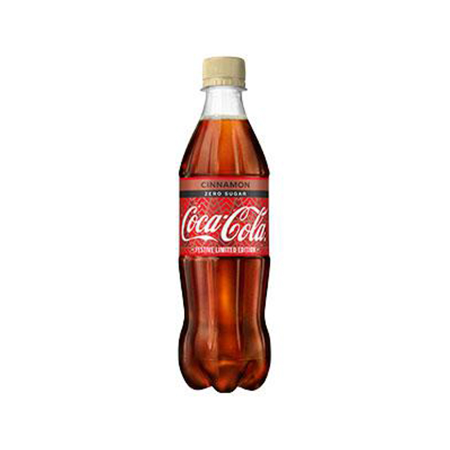 Coca-Cola Zero Sugar Cinnamon bottle on white background.
