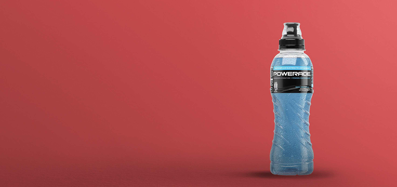 Powerade bottle on red background
