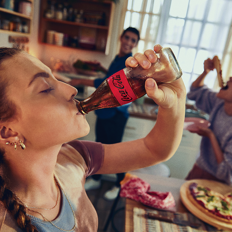 pizza and a ice-cold coca-cola zero sugar