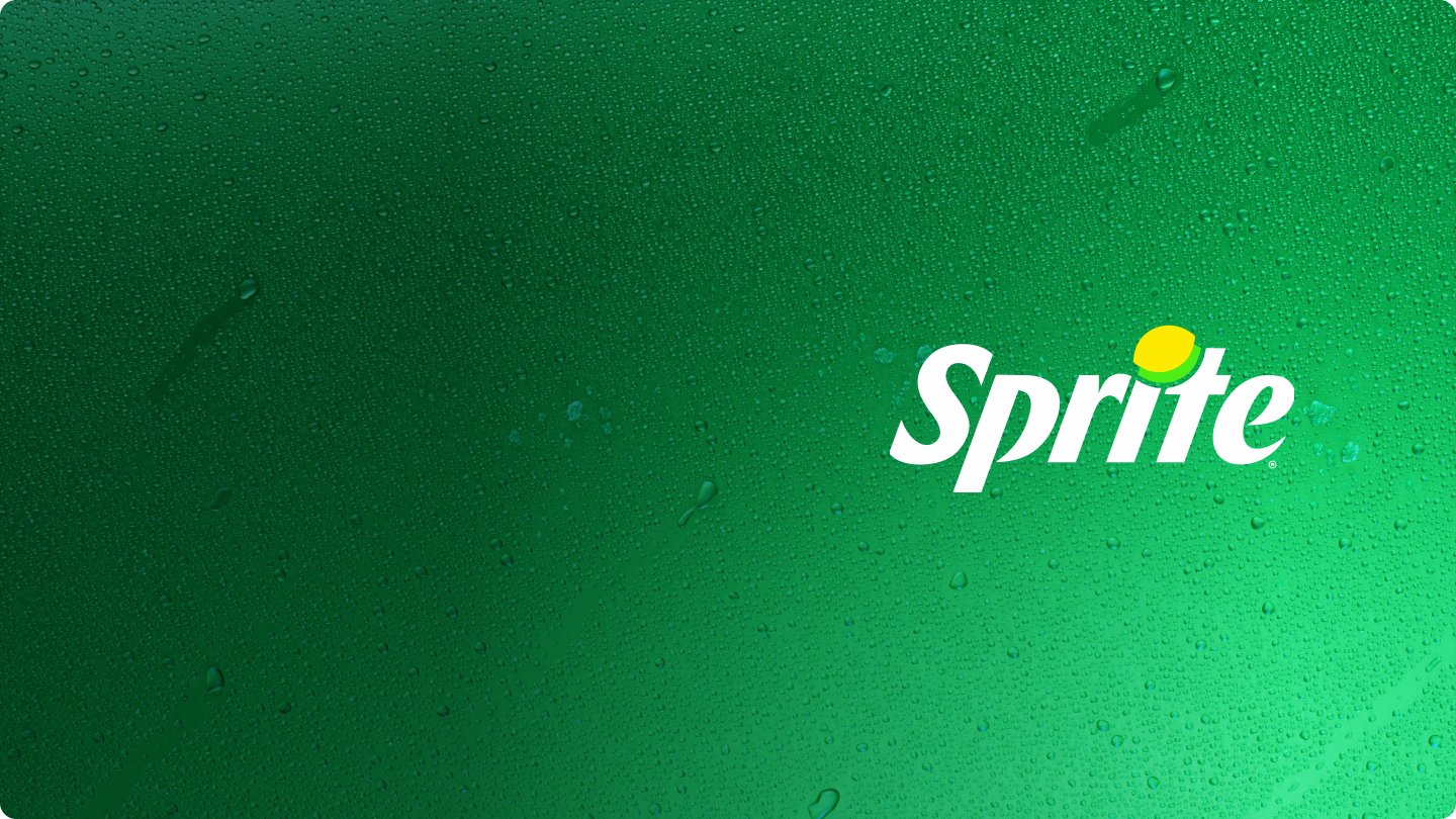 women drinking a bottle of sprite zero