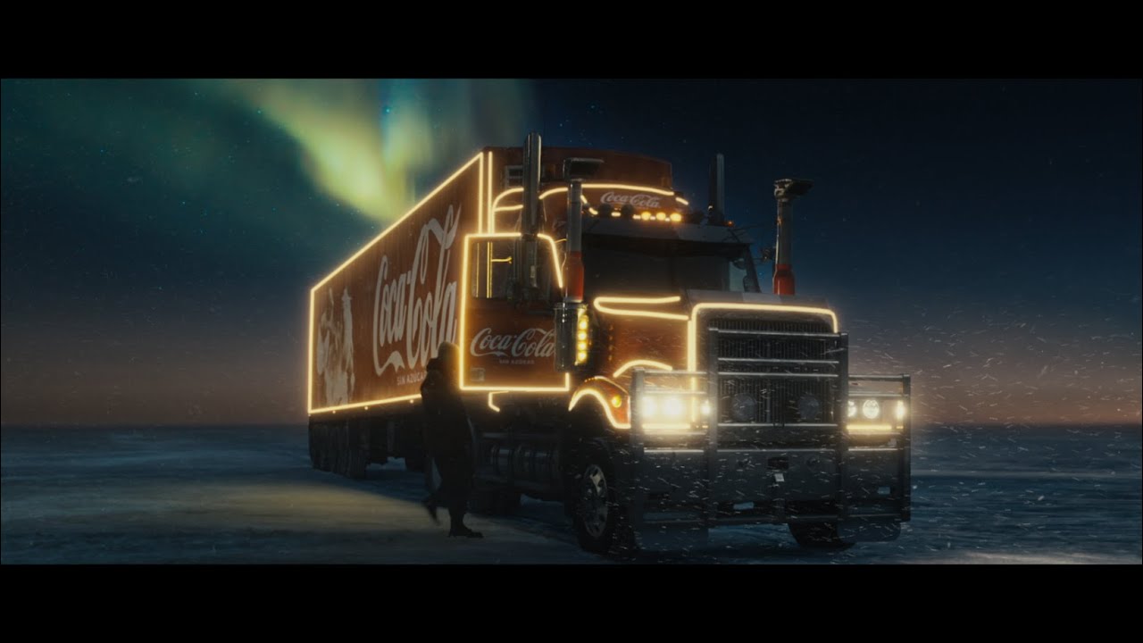 Camión de Coca-Cola con luces navideñas en YouTube