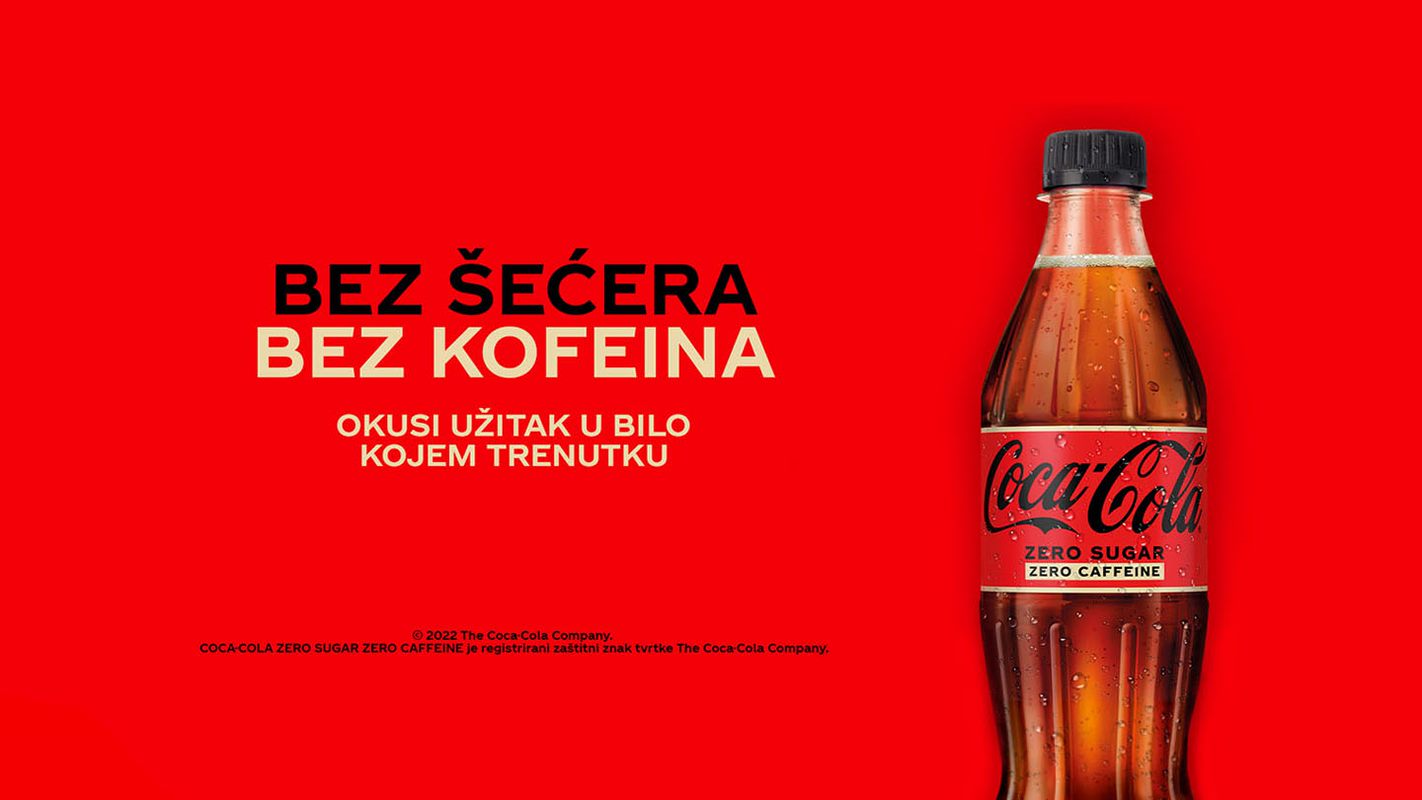 crveni baner bez šećera bez kofeina sa coca-cola bočicom u desnom kutu