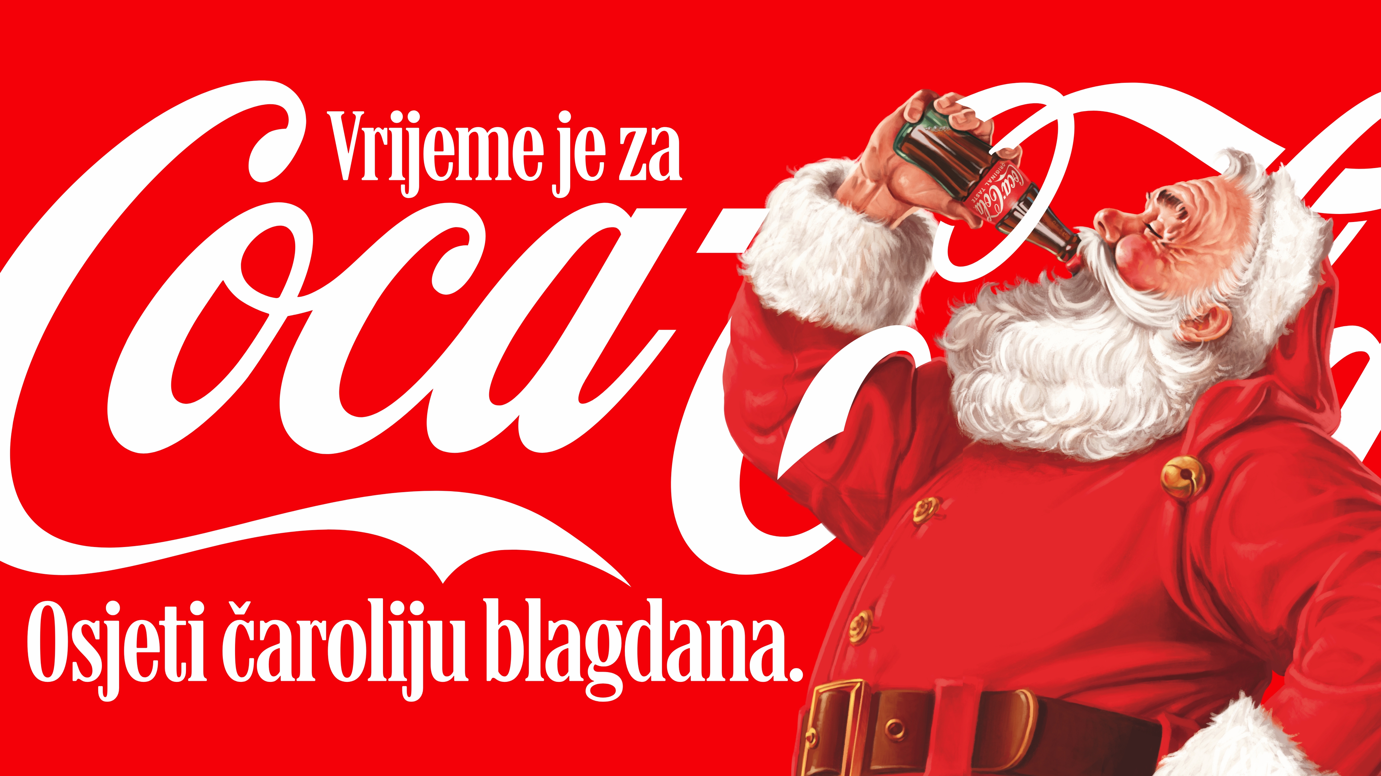 Djed Božičnjak pije Coca-Colu