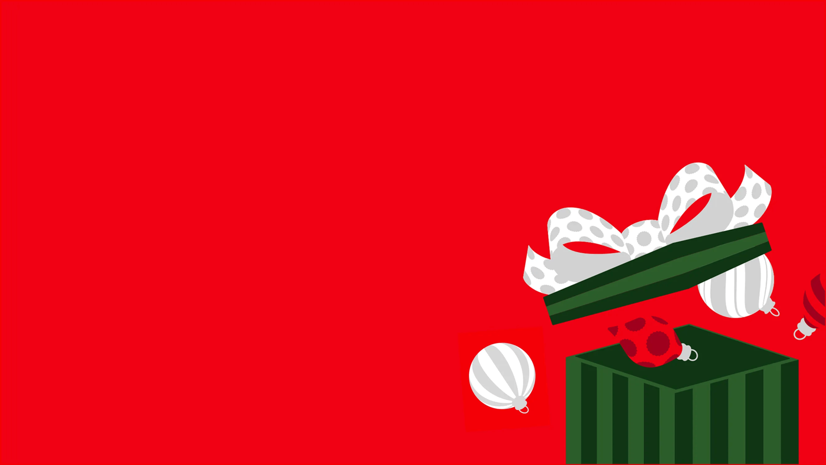 Zelena poklon kutija sa belom mašnom, iz koje ispadaju praznične kuglice, na jarko crvenoj pozadini