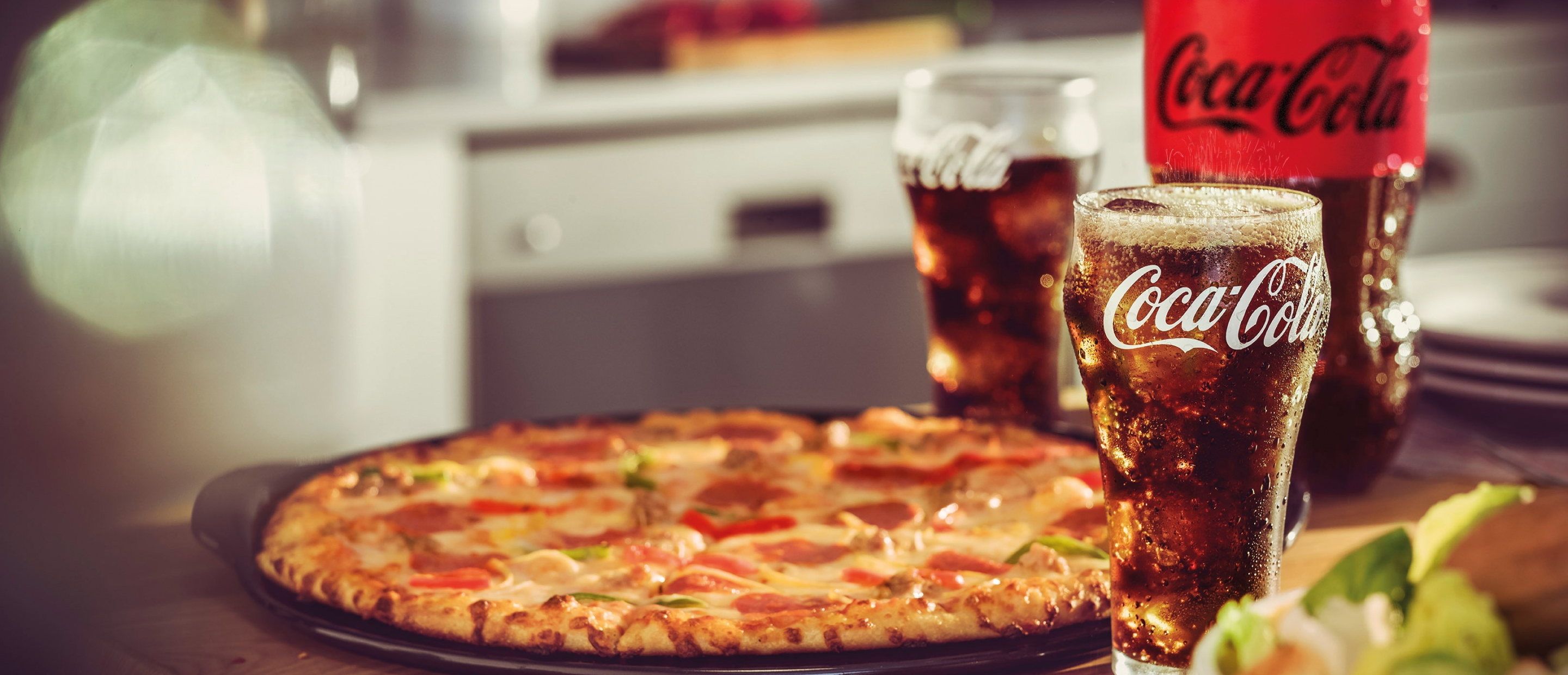 Pizza and Coca-Cola in glass