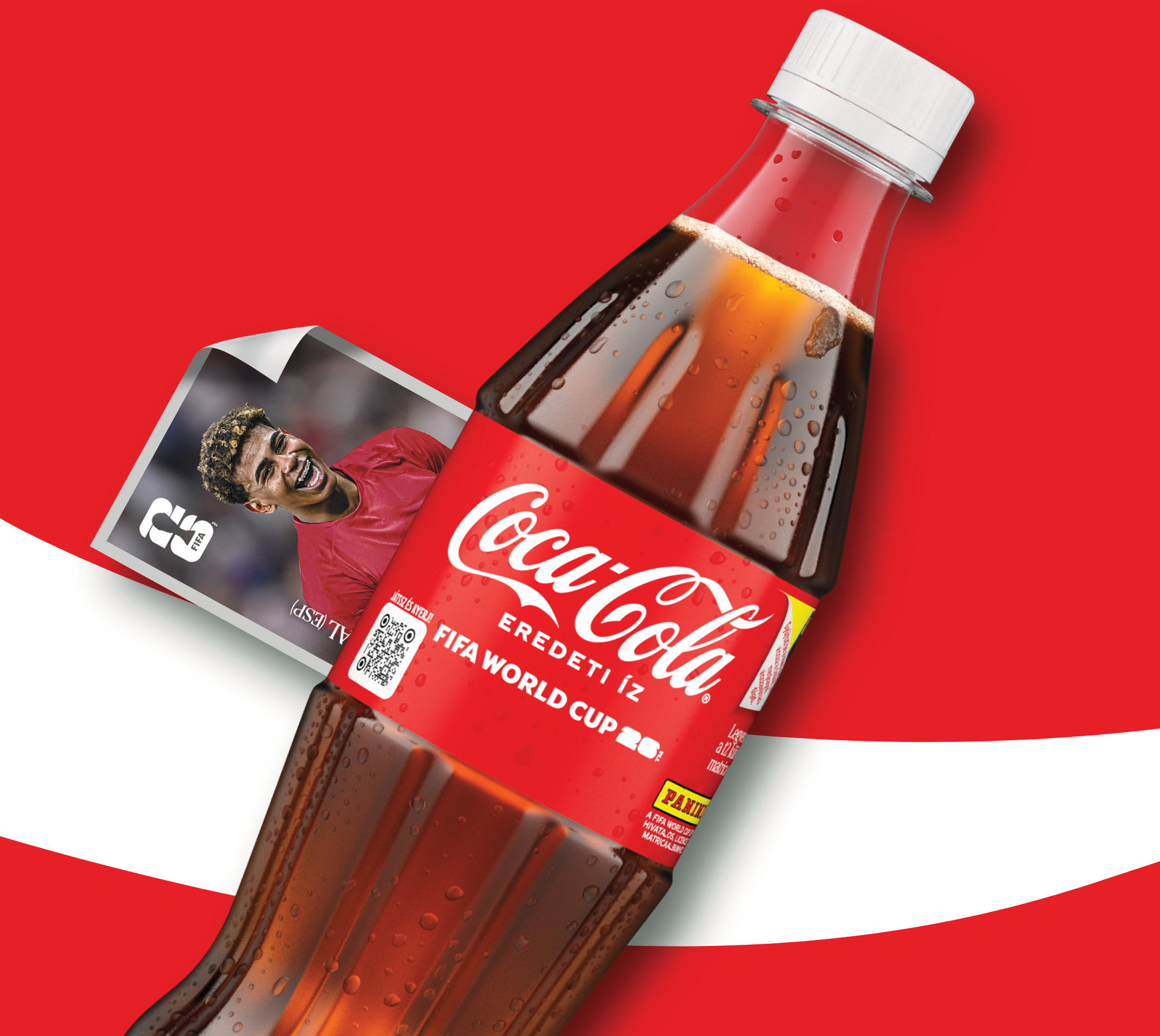 Coca-Cola Zero Sugar bottle with FIFA World Cup 2026 branding, shown beside Panini sticker packs on a red background.