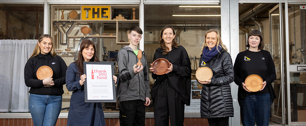 No repro fee
31-1-22
Picture shows from left members of the The Yard @ Solas Project Rachel Darcy; Ashling Golden: Justice Programmes Manager; Jack Ryan;Agnese Filippi, Country Manager, Coca-Cola Ireland; Amy Carey, Chief Executive Officer, Solas Project; and Leisha McPartland: Youth Worker / Woodwork Instructor who received their 2021 Coca-Cola Thank You Fund award in Dublin. “A Fund Supporting the Future of Young People across the Island,” thirteen successful non-profit organisations will each benefit from a grant share of the €100,000 Coca-Cola Thank You Fund. This year over 280 non-profit organisations applied for the Fund which has donated €1,255,000 in grants to over 100 non-profit and community groups since 2011. To find out more visit https://www.coca-cola.ie/thankyou. Pic:Naoise Culhane-no fee