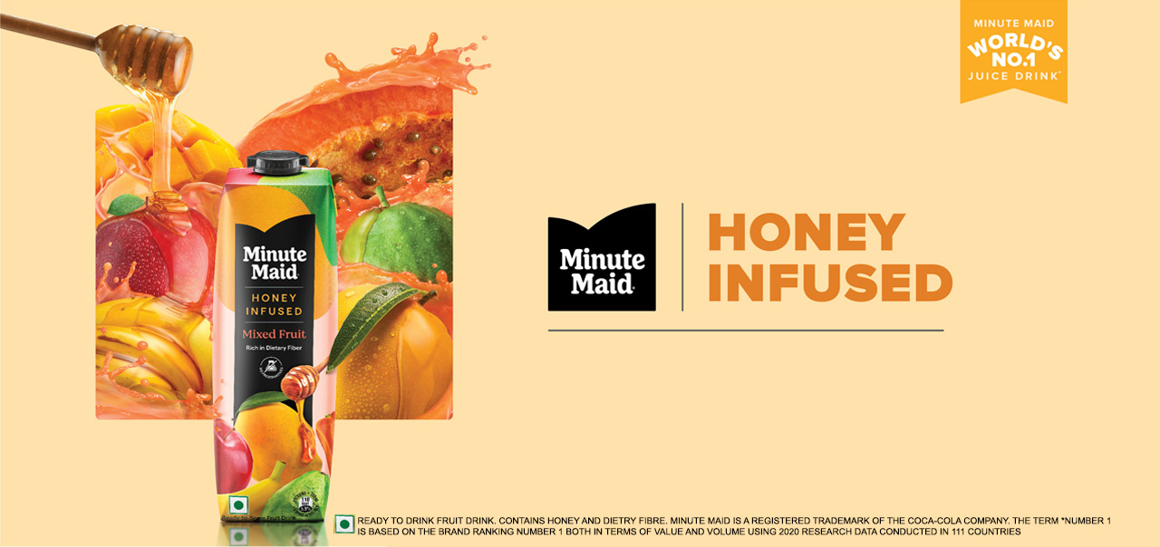 3 cartons of minute maid juice in flavours mixed fruit, guava and apple with an image of fruit. Honey being poured on fruits  and a lady drinking juice from a glass. In the middle there is text reading honey infused juice drink.