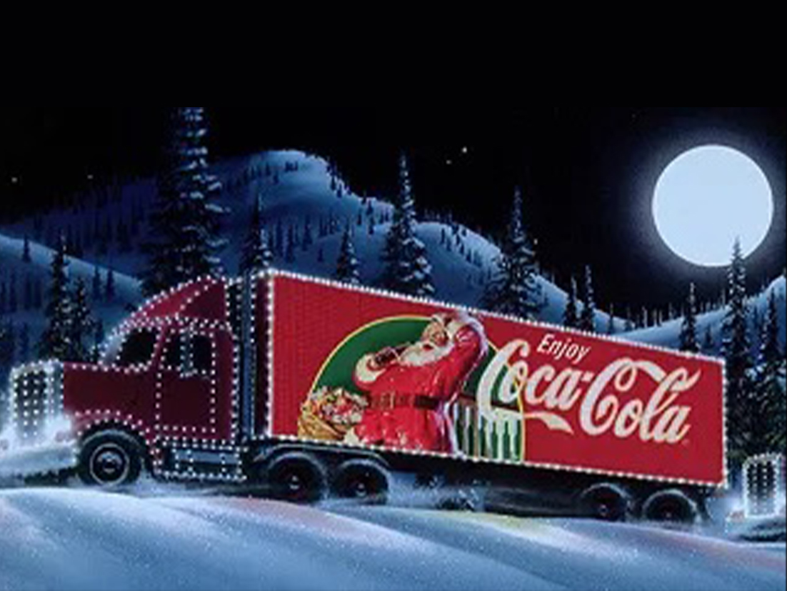 雪道を走るコカ・コーラのコンテナトラック