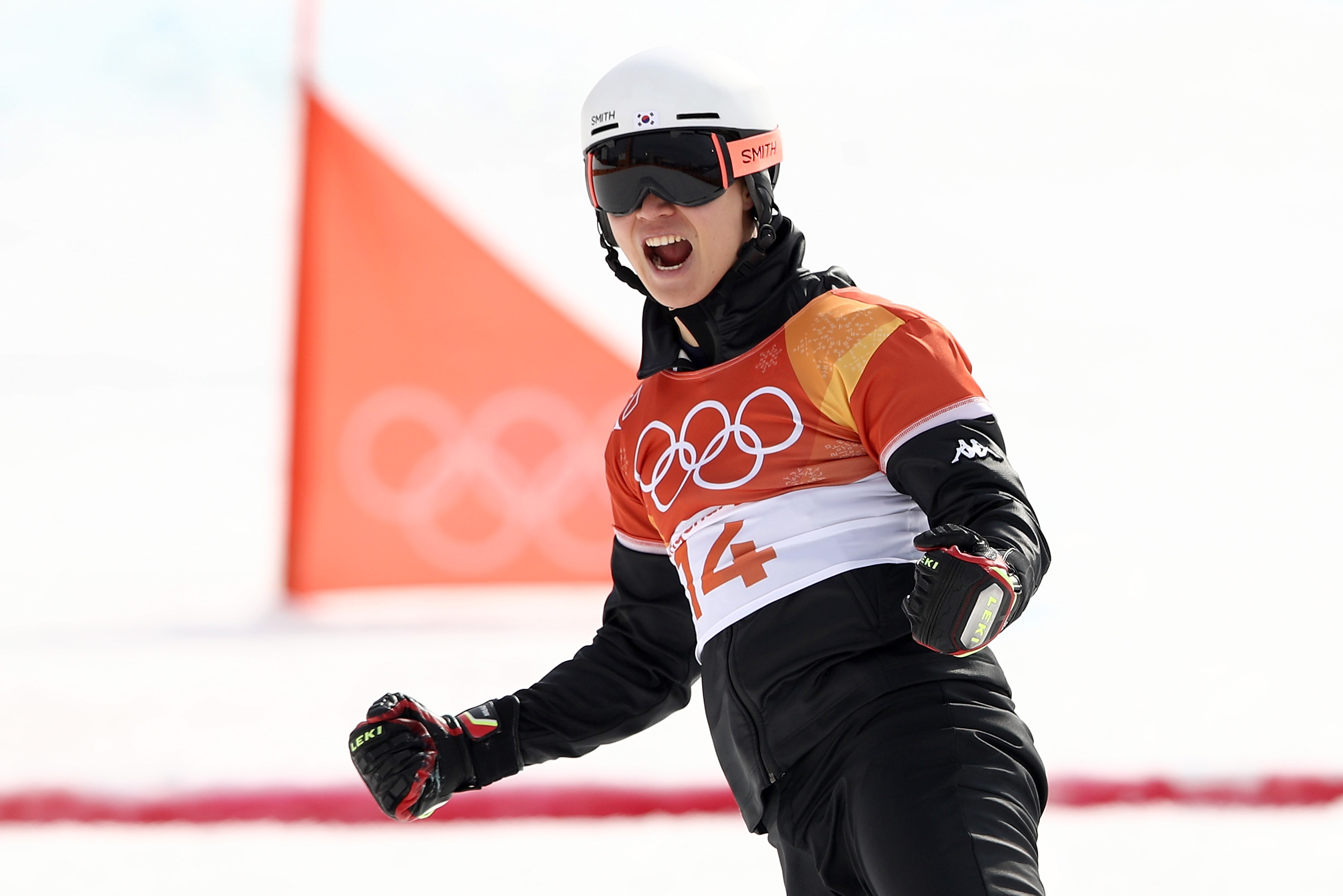 PYEONGCHANG-GUN, SOUTH KOREA - FEBRUARY 24:  Sang-ho Lee of Korea celebrates during the Men's Snowboard Parallel Giant Slalom Quarterfinal on day fifteen of the PyeongChang 2018 Winter Olympic Games at Phoenix Snow Park on February 24, 2018 in Pyeongchang-gun, South Korea.  (Photo by Cameron Spencer/Getty Images)