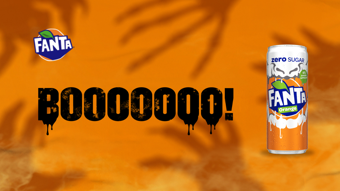Halloween desktop banner - NL Blikje Fanta met enge afbeelding en tekst