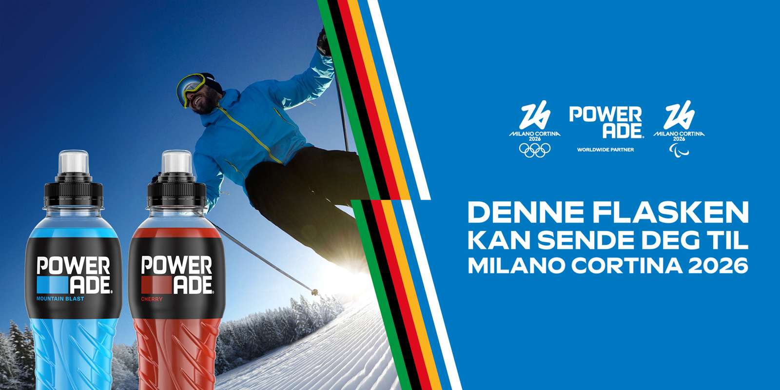 To Powerade-flasker foran en person som står på ski og tekstmelding om tur til Milano Cortina 2026
