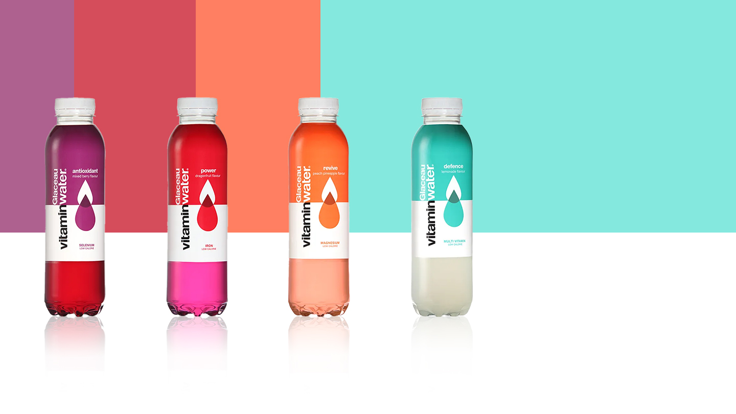Glaceau Vitaminwater varieties on a multicolored background