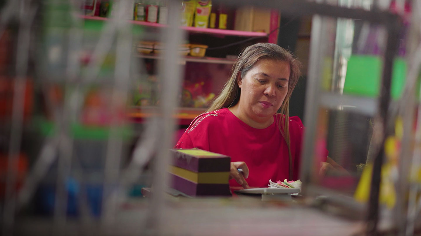  Woman wearing red shirt while working