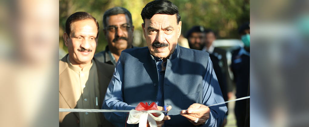 A group of men at the inauguration of Pakistan's first plastic road