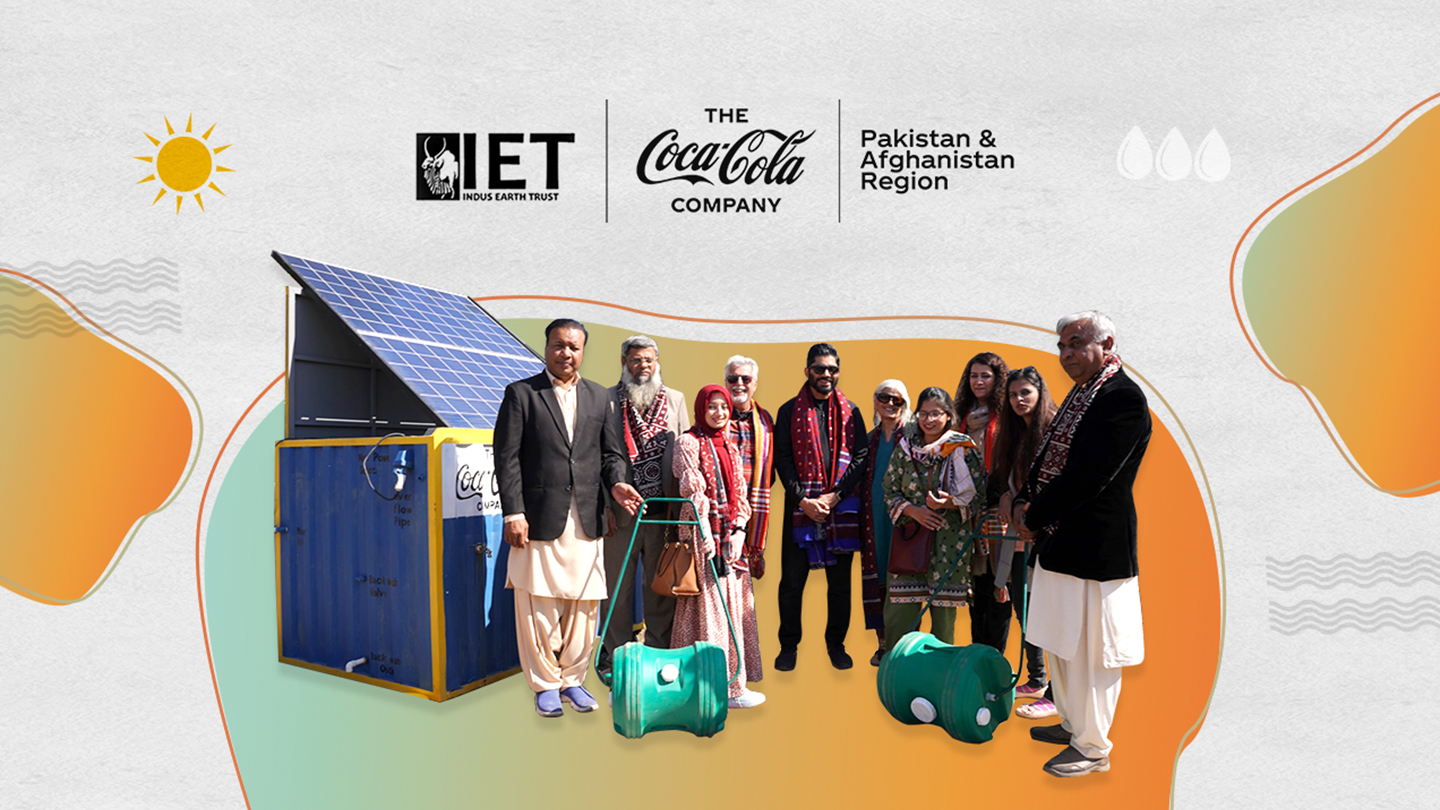 A photograph of the Inauguration of the Solar Powered Water Filtration System with some graphical elements displayed in the background