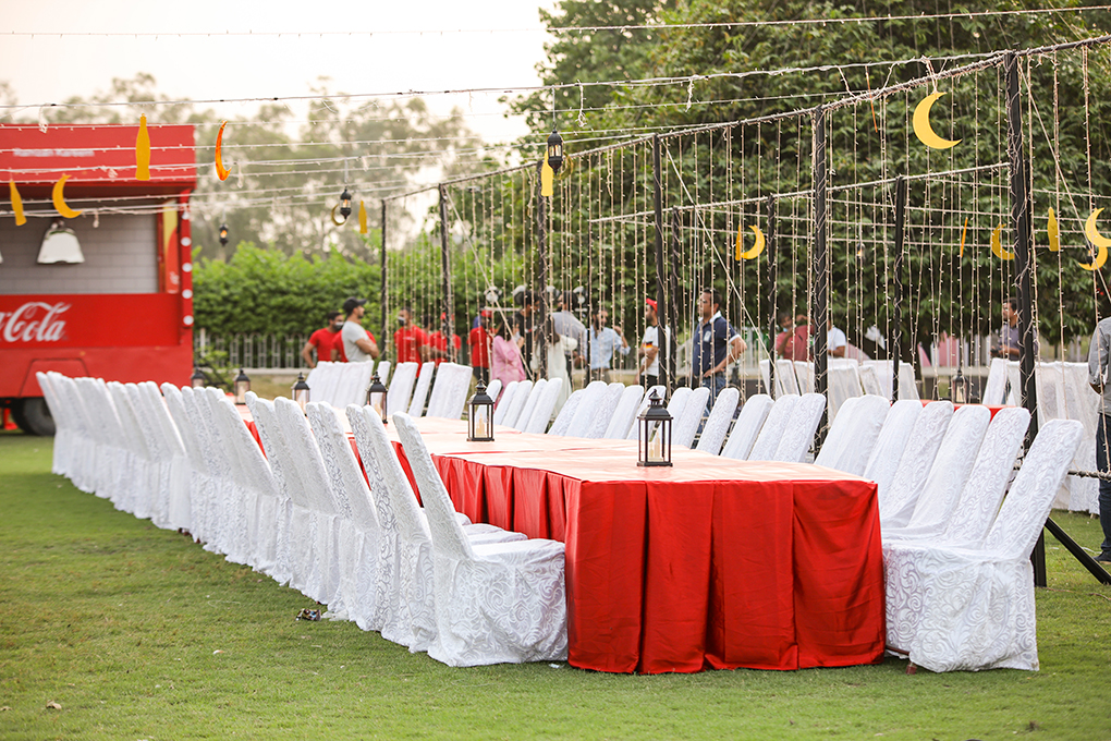 A long dining table in an outdoor area