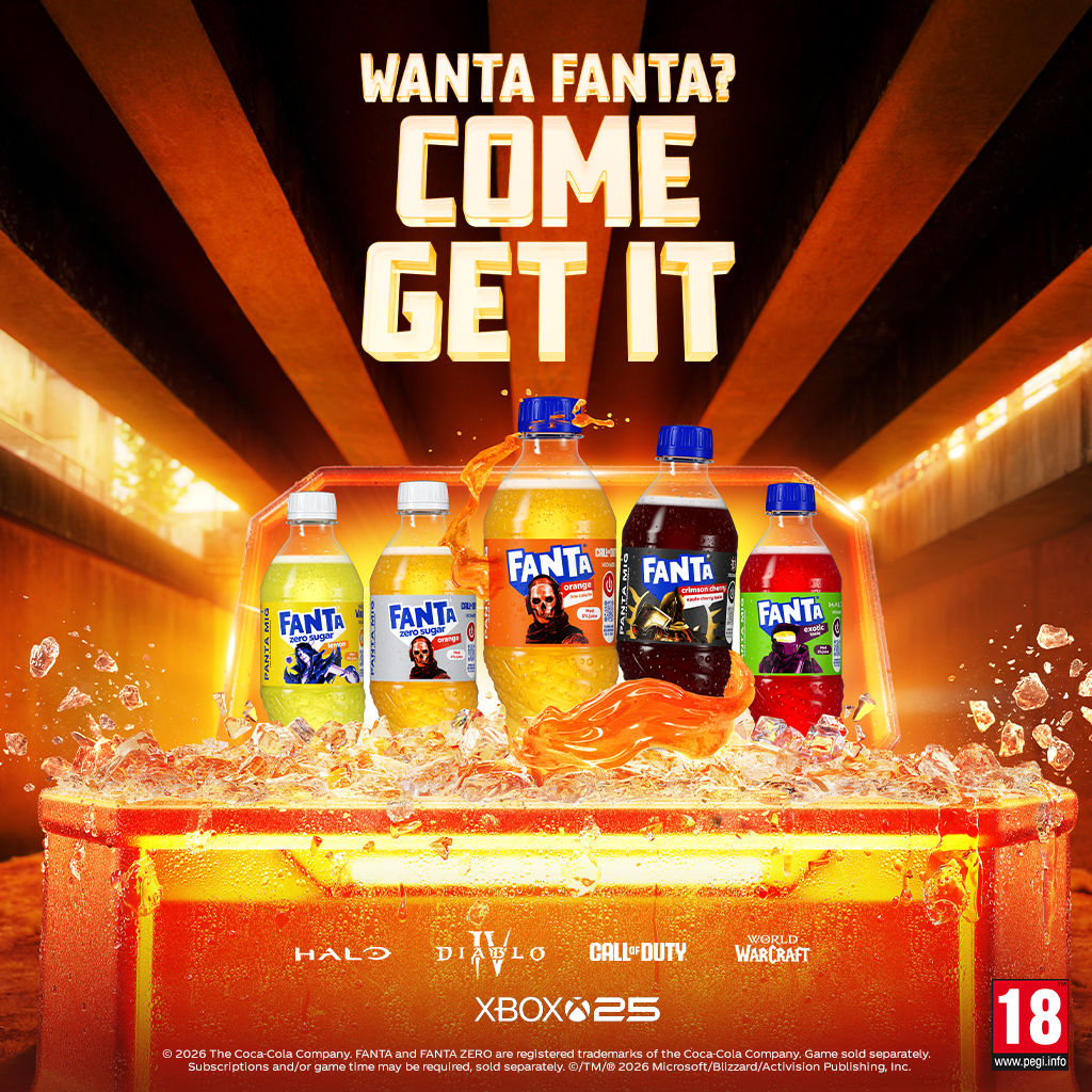 Fanta reklaamplakat loosungiga „Come Get It“, kus keskel on Fanta pudelid oranžil lava‑taustal.