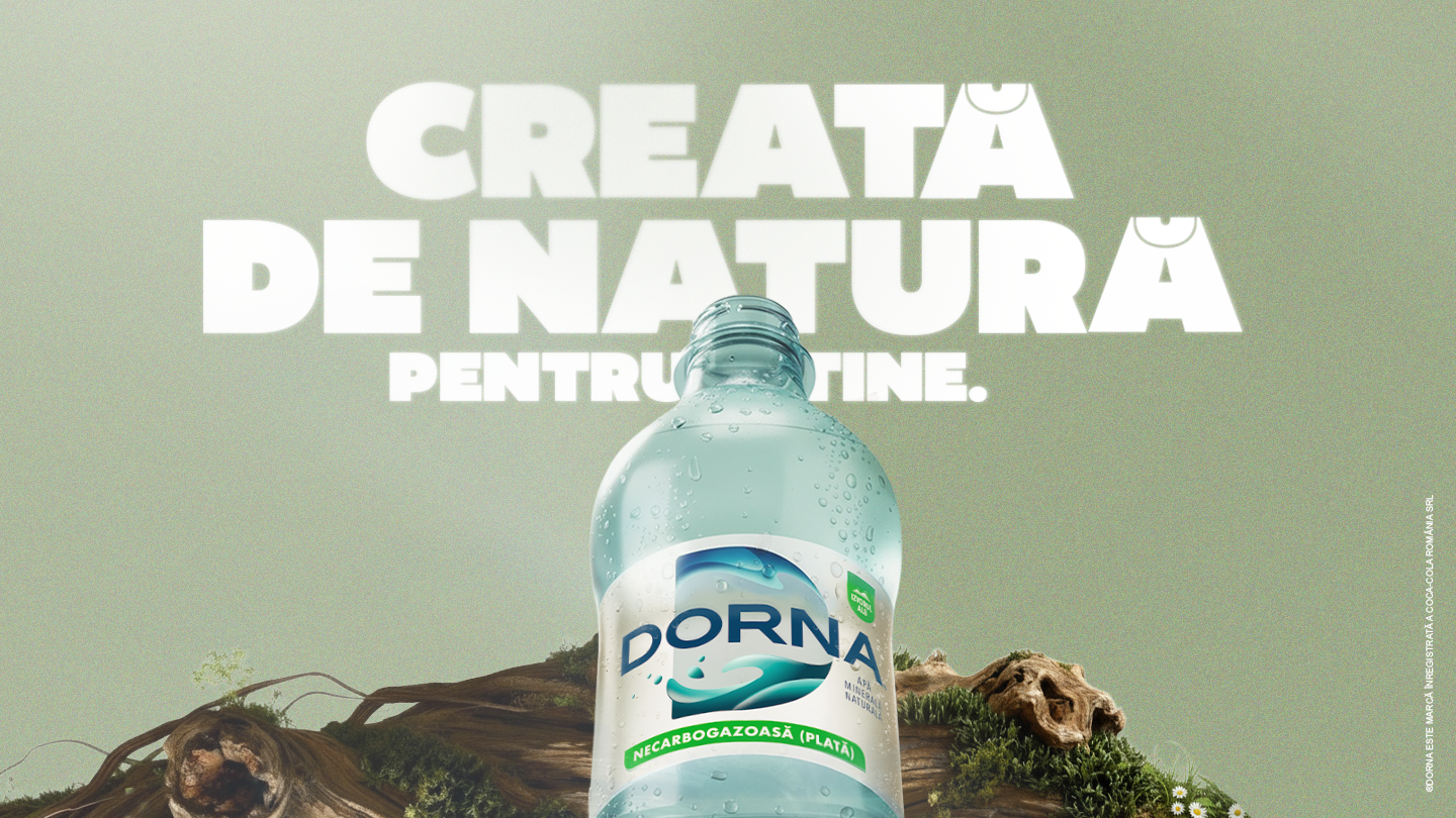 Sticla de Dorna pe un fundal verde cu textul Creata de natura pentru tine