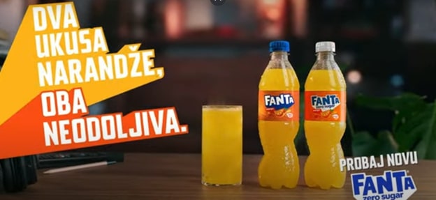 Girl drinking Fanta