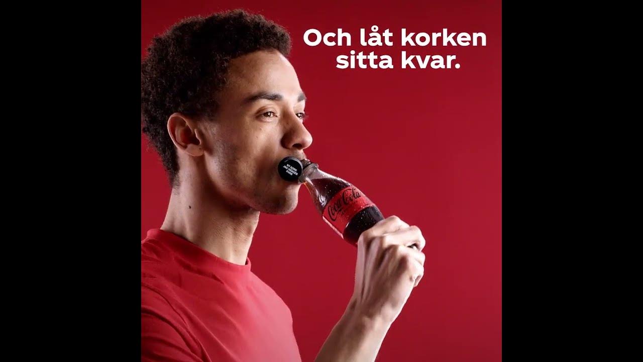 Imbäddad YouTube-video som visar Coca Colas nya PET-flaskor med skruvkork som sitter fast.