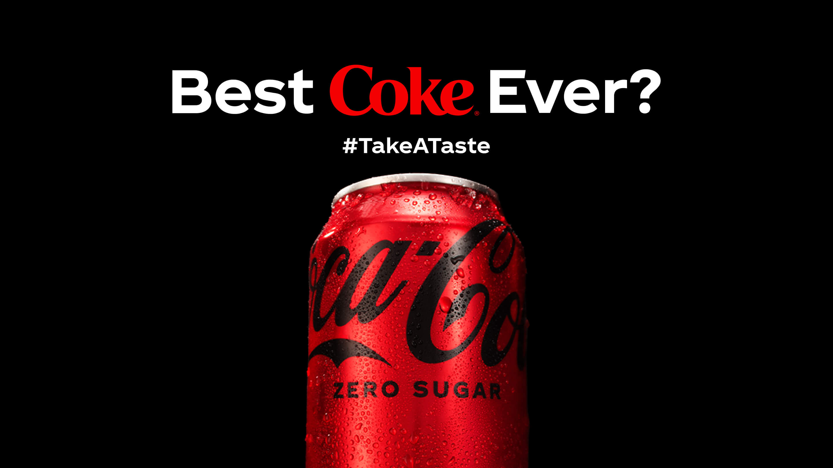 Detail of a Coca-Cola Zero Sugar can on black background with the phrase "Best Coke Ever? #TakeATaste"