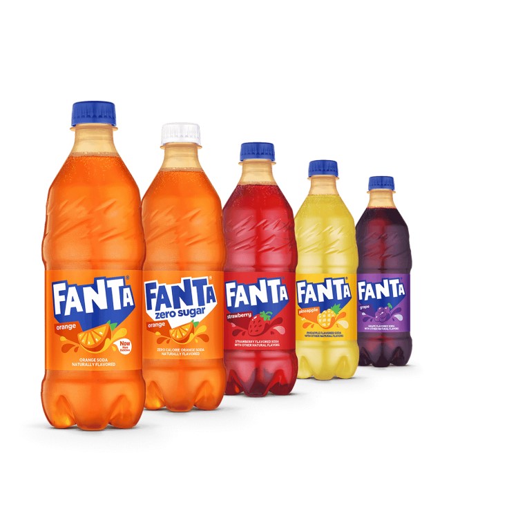 Five bottles of different Fanta flavored sodas