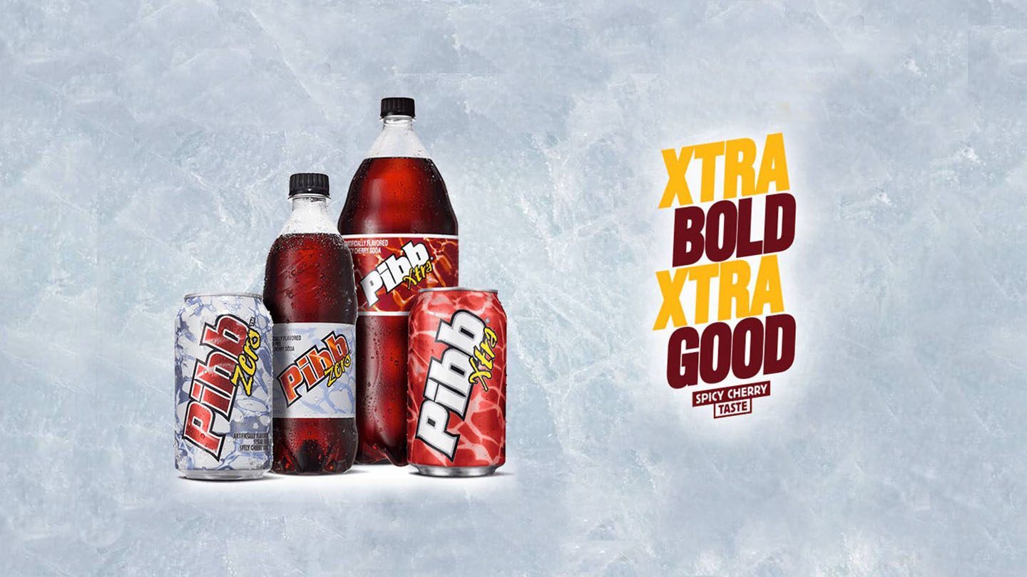 Four packaging of Pibb Xtra products on icy background