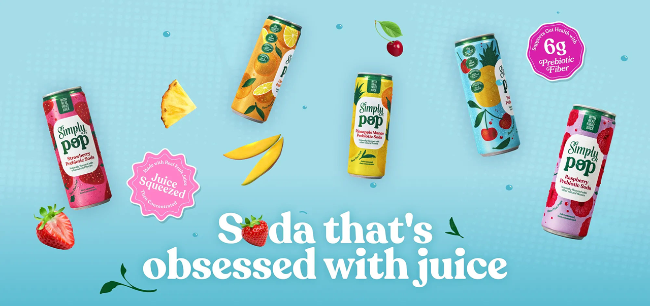 Five Simply Pop prebiotic soda cans — Strawberry, Orange, Pineapple Mango, Fruit Punch, and Raspberry — are displayed on a light blue background with scattered fruit, a "Juice Squeezed" badge, a "6g Prebiotic Fiber" callout, and the tagline "Soda that's obsessed with juice."