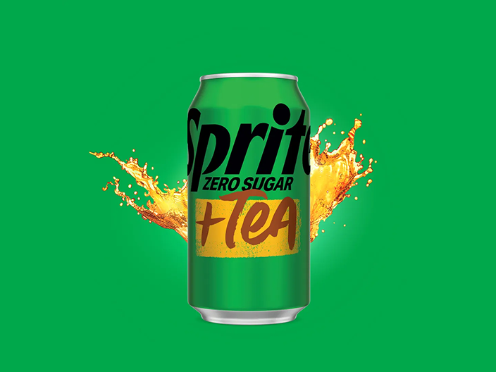 A can of Sprite + Tea Zero Sugar with a splash of tea on a green background.
