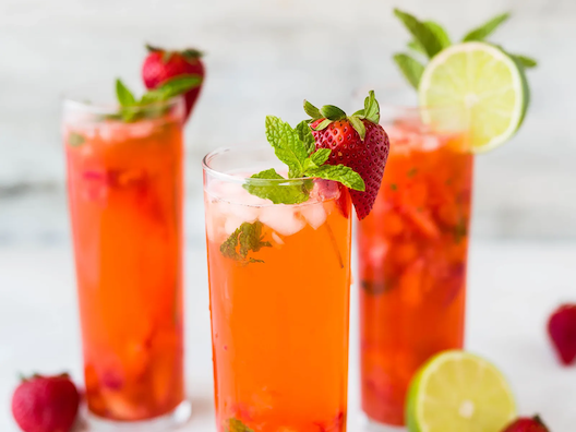 A glass with Strawberry Lime Spritz