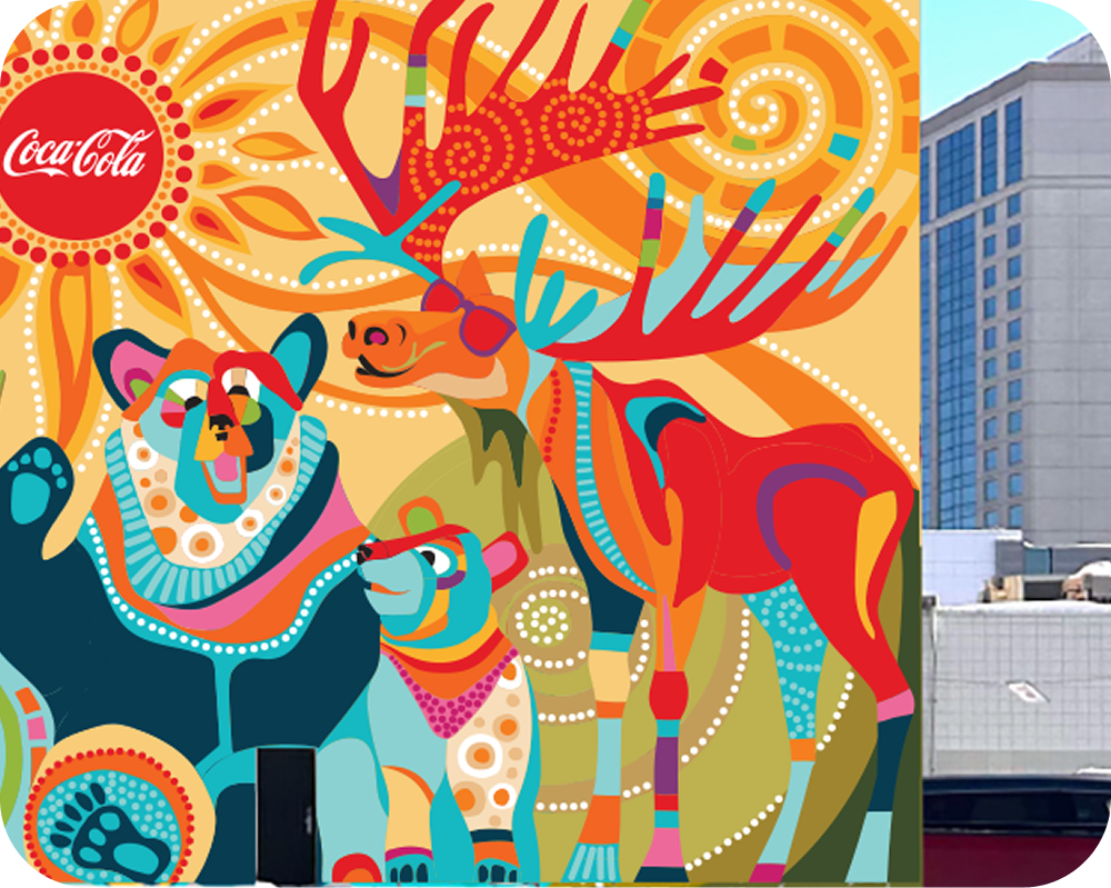 Right side of the vibrant Alaskan Coca‑Cola mural showing a stylized moose and bears against a city skyline.